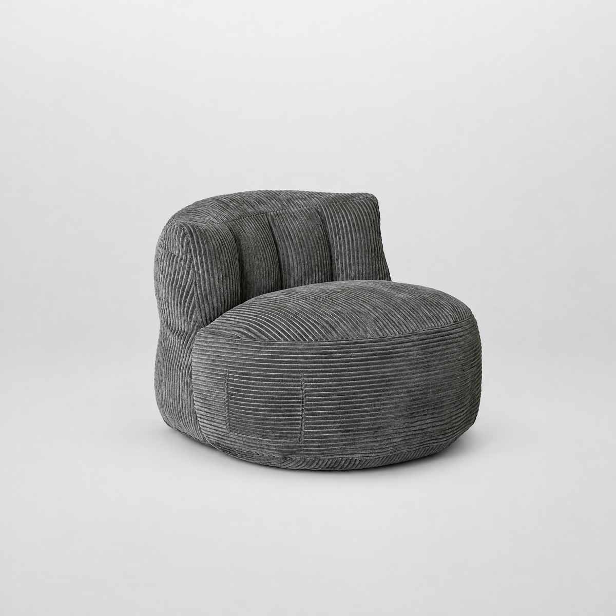 Galet, fauteuil pouf géant en velours côtelé gris foncé, sur fond neutre